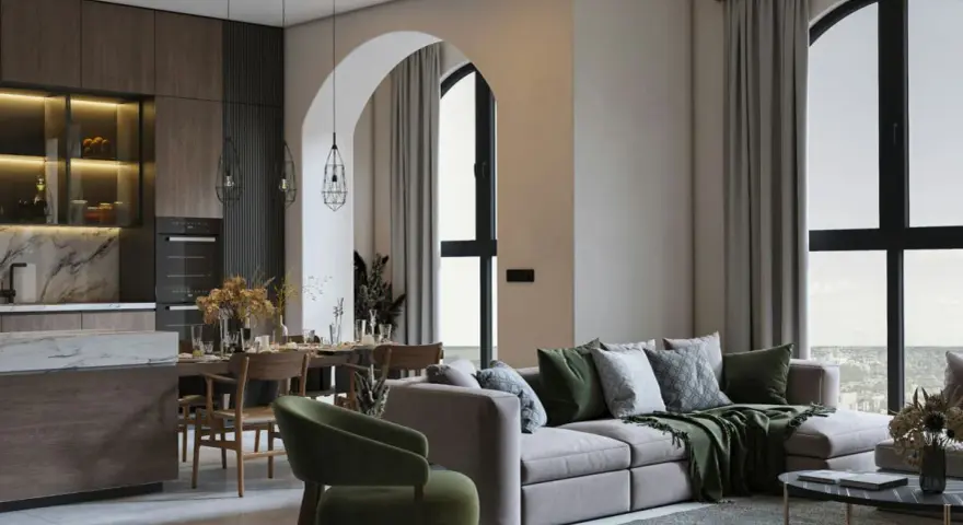 Un soggiorno con cucina open space, un divano moderno e un tavolo da pranzo. L'arredamento casa moderno crea un ambiente accogliente.