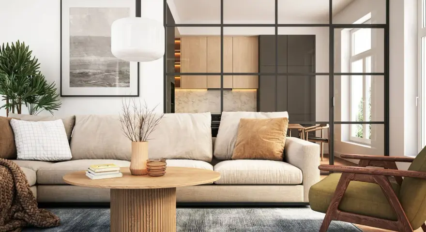 Gemütliche wohnideen wohnzimmer: Beige Sofa, Holztisch, grüner Sessel und eine offene Küche hinter Glas.