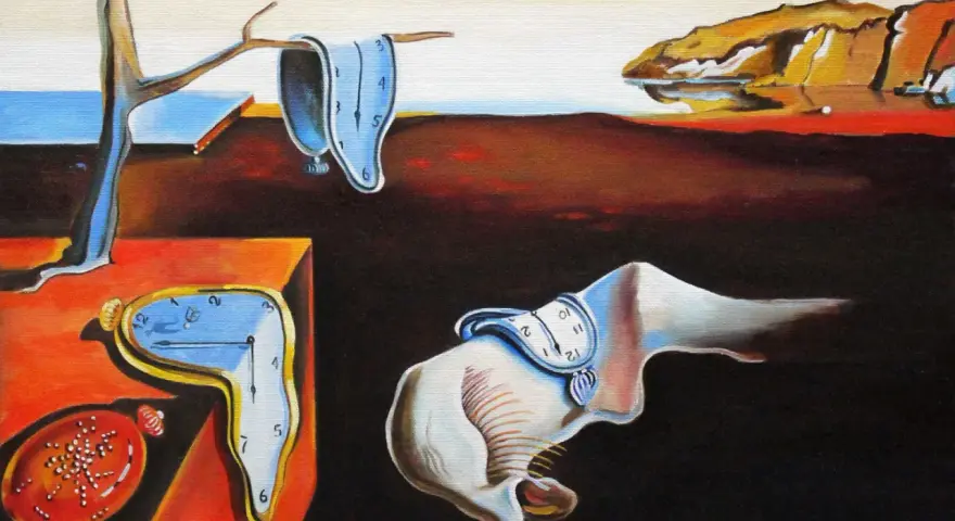 Salvador Dalí "Trwałość pamięci" - surrealistyczny krajobraz z topiącymi się zegarami, symbolem ulotności czasu.