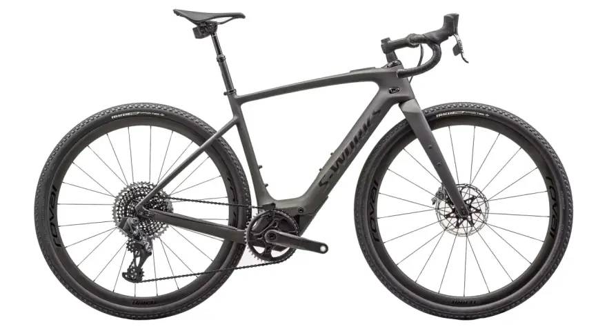 A sleek, dark grey gravel bike, showcasing one of the versatile types of bikes built for adventure.