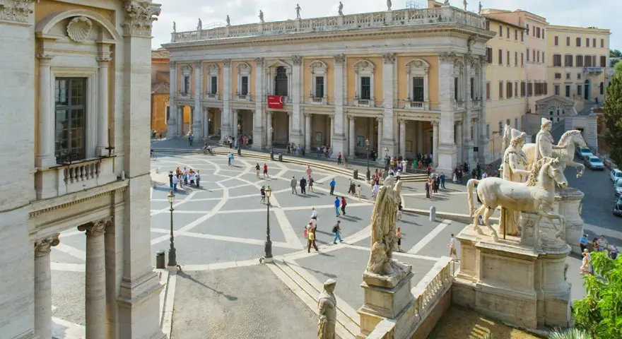 Piazza del Campidoglio, Rome, with the Capitoline Museums' facade and statues.