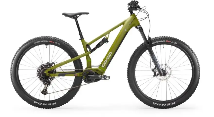 A green Co-op electric mountain bike, ready for a REI bike tune-up, with full suspension and knobby tires.
