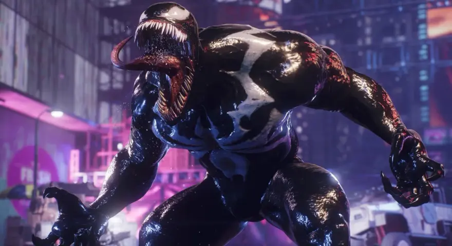 Venom, con su lengua fuera y dientes afilados, se cierne amenazante en una ciudad nocturna, listo para la acción en **Platino Spiderman 2**.