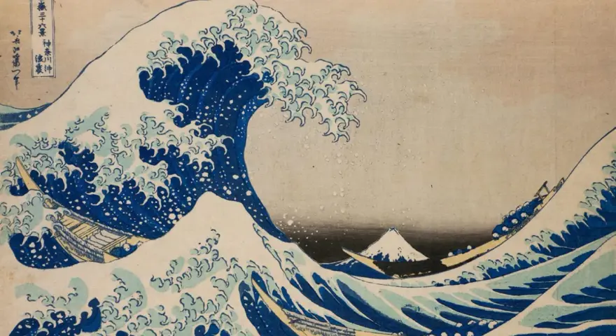 La Grande Vague de Kanagawa, une des plus célèbres oeuvres d'art connues, montre des bateaux luttant contre une vague immense, avec le Mont Fuji en arrière-plan.