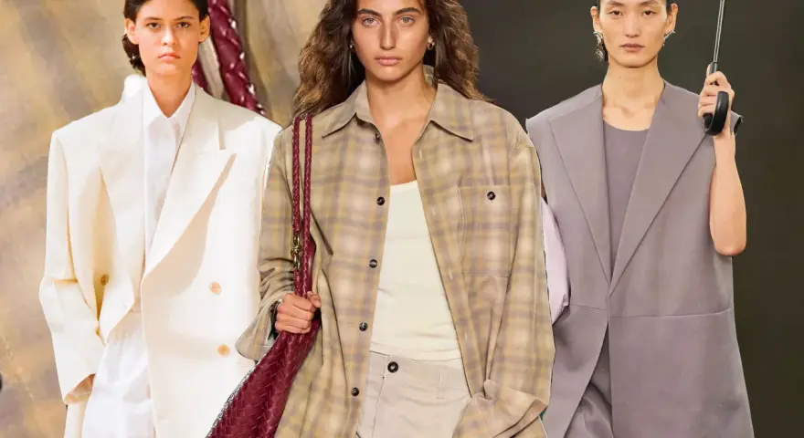 Modelos exhiben atuendos de lujo silencioso: un traje blanco impecable, una camisa a cuadros con bolso de cuero y un traje gris con paraguas.