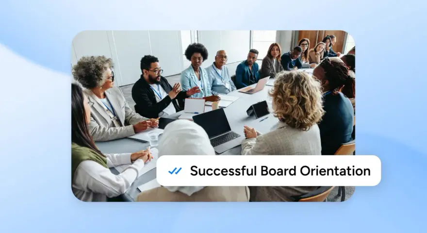 A diverse group of people are seated around a conference table, engaged in discussion during a new board member orientation.