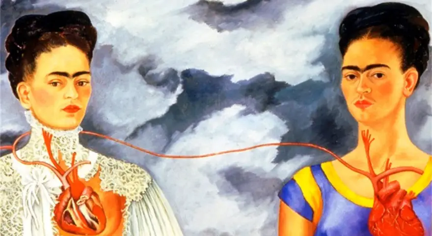 Les deux Fridas, deux portraits de l'artiste reliés par une artère, l'une en robe victorienne, l'autre en tenue colorée.