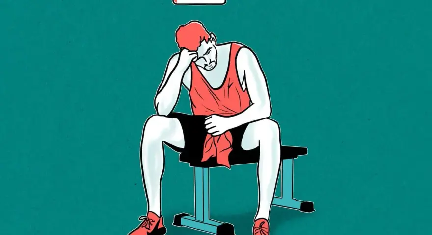 Homme épuisé, assis sur un banc, avec une batterie faible au-dessus de sa tête, symbolisant une carence en protéines.