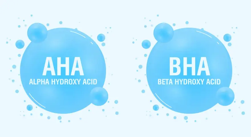 Dwa bąbelki z napisem AHA (Alpha Hydroxy Acid) i BHA (Beta Hydroxy Acid), symbolizujące składniki kosmetyków.