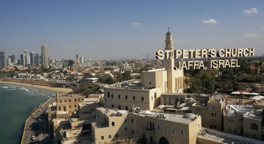 St. Peter's Church in Jaffa, Israel, a city with deep roots in the bible, overlooks the Mediterranean Sea and a modern skyline.