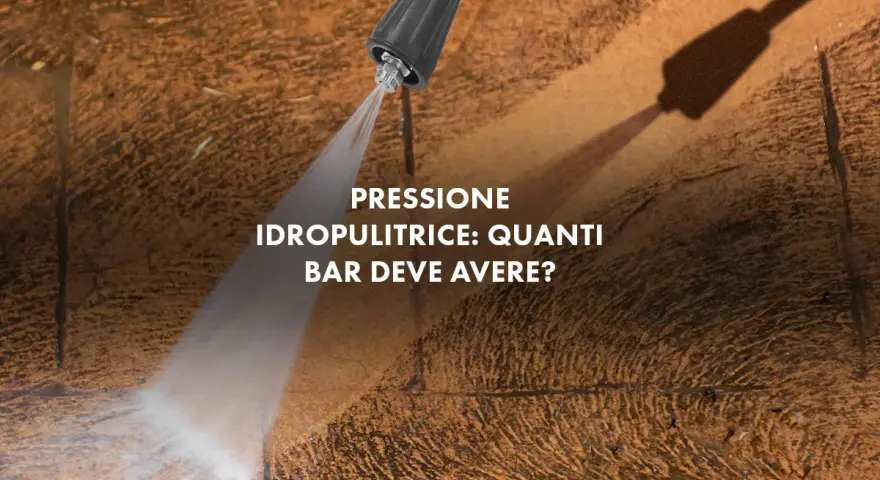 Ugello idropulitrice spruzza acqua su una superficie ruvida. La domanda è: quanti bar deve avere una buona idropulitrice per pulire efficacemente?