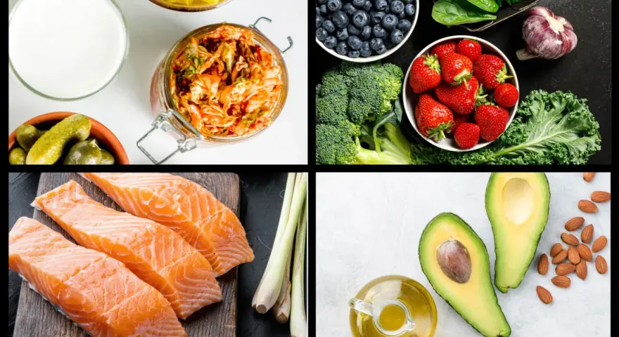 En bild med livsmedel som kan ingå i en antiinflammatorisk kost: lax, bär, grönsaker, avokado, olivolja och fermenterad mat.
