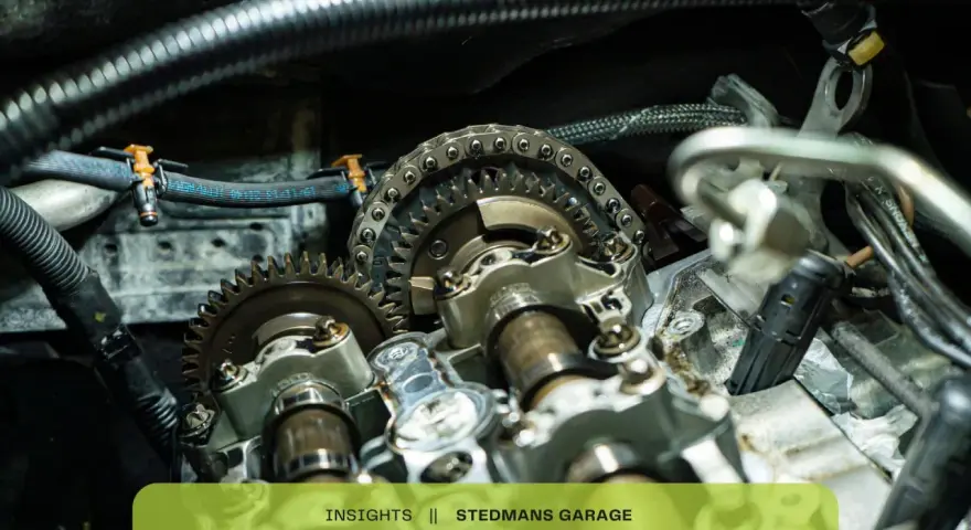 Close-up of car engine timing chain and gears. This could be related to a p0017 code issue.