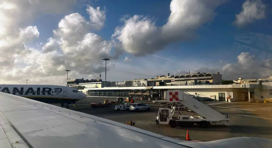 Pisa International Airport, the closest airport to Cinque Terre, with a Ryanair plane on the tarmac.