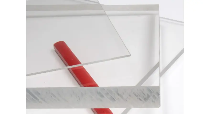 Clear acrylic sheets with a red rod on a white background.