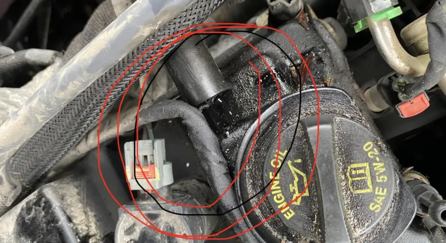 Zaznaczony przewód zapłonowy i wtyczka mogą być przyczyną błędu dtc p0301 volkswagen.
