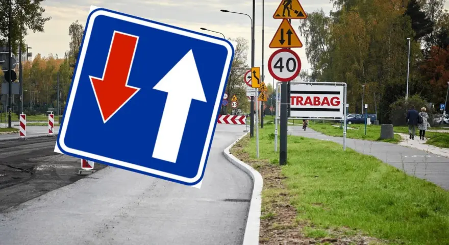 Znak D5 informuje o ruchu jednokierunkowym, ale tu strzałka w dół sugeruje objazd.