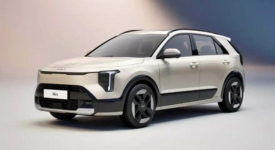 Biały Kia Niro EV z nowoczesnymi światłami i czarnymi akcentami, gotowy na ekologiczną podróż.