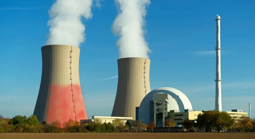 Dwie chłodnie kominowe i kopuła elektrowni atomowej, symbolizujące moc elektrowni atomowej w Polsce.