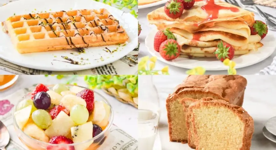 Desayuno con postres sin gluten: gofres, crepes con fresas, ensalada de frutas y bizcocho.