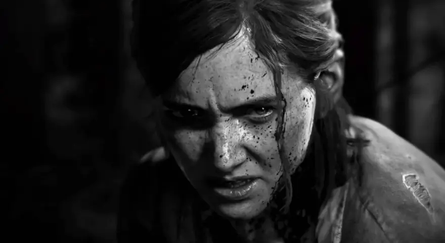 Primer plano de Ellie, con la cara sucia y ensangrentada, mirada intensa. Un momento icónico de los trofeos The Last of Us 2.