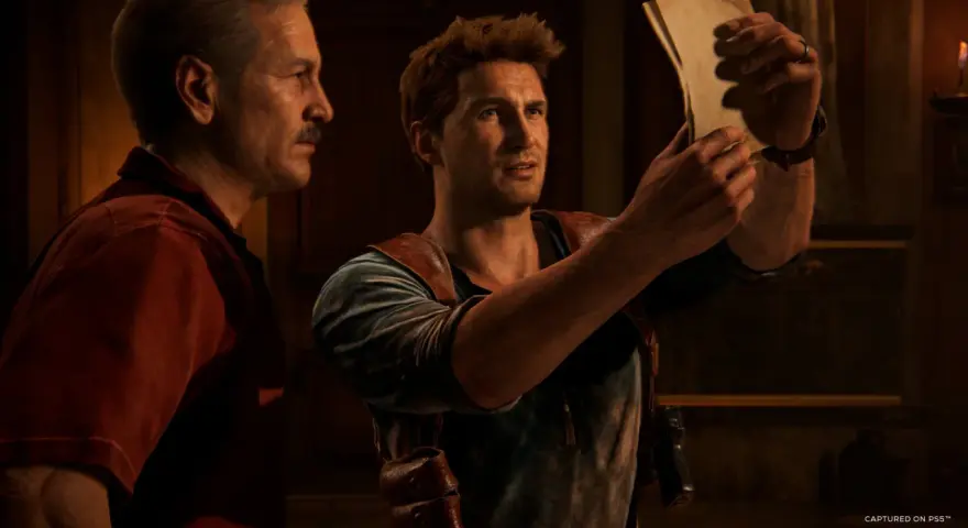 Nathan Drake i jego ojciec badają starą mapę, szukając wskazówek do skarbu. To kluczowy moment w Uncharted 5.