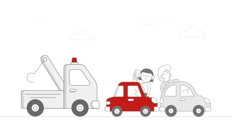 Pomoc drogowa to coś, co ratuje w potrzebie. Holownik zabiera czerwone auto z pasażerami, a za nim stoi kolejne uszkodzone auto.