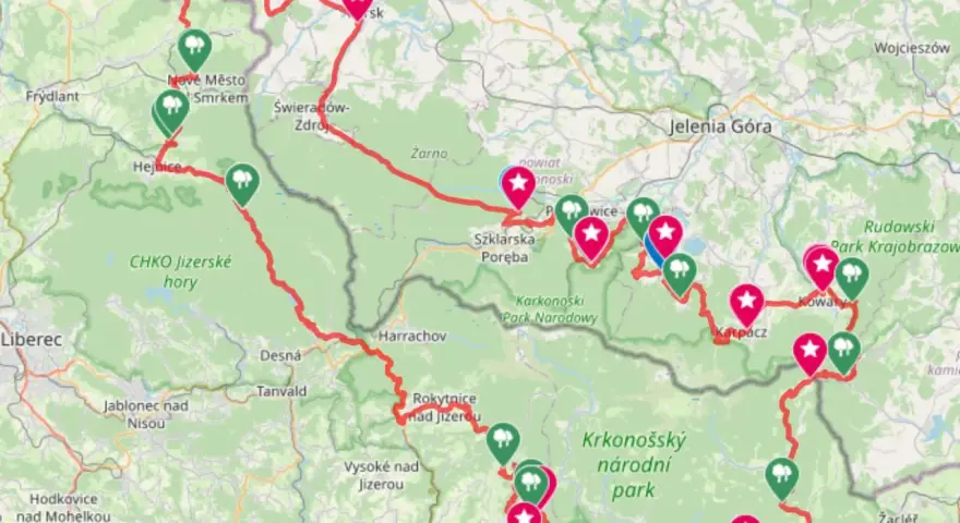 Trasa rowerowa przez Sudety i Karkonosze, z zaznaczonymi punktami w parkach narodowych i krajobrazowych.