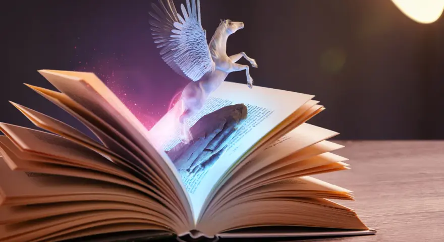 Otwarta księga, z której wyłania się skrzydlaty koń. To właśnie jest **fantasy co to** znaczy – magia i niezwykłe stworzenia ożywiające opowieści.