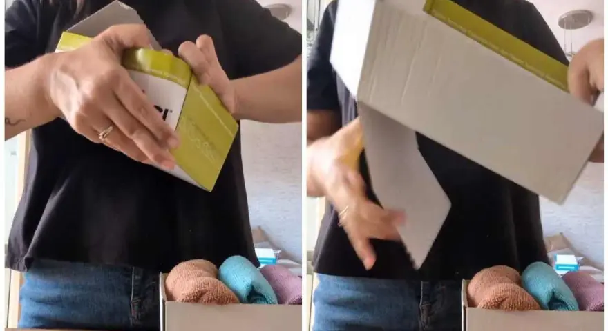 Come sistemare le scarpe con le scatole: una persona apre una scatola, rivelando un interno organizzato con calzini piegati.