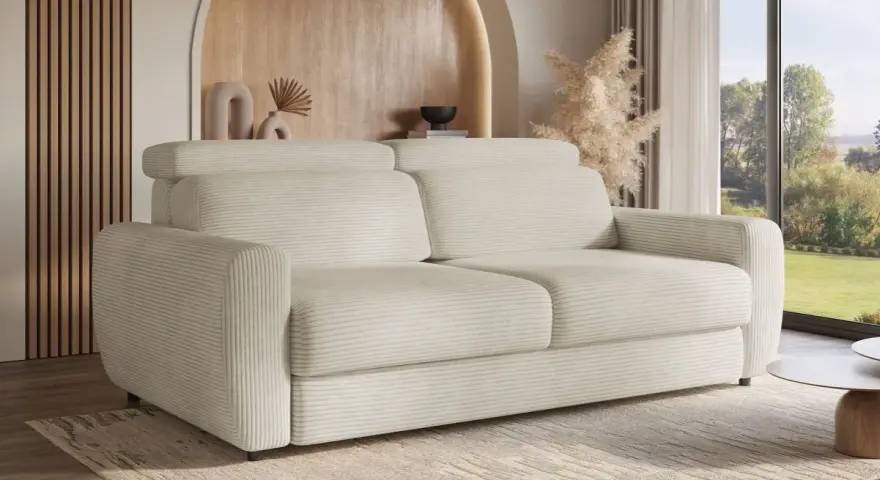 Canapé convertible meilleur, en velours côtelé crème, dans un salon moderne avec vue sur la nature.