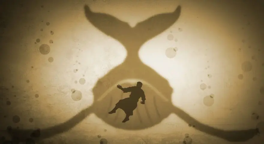 A silhouette of a man falls into the mouth of a giant whale, a classic sign of Jonah's story.