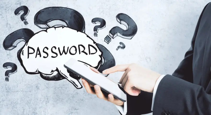 Dłoń trzyma tablet, a nad nim chmurka z napisem "PASSWORD" i znaki zapytania. Jak wymyślić hasło?