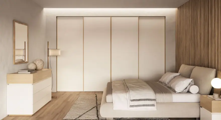 Camera da letto scandinava con letto accogliente, armadio a scomparsa e comò in legno chiaro. Un'oasi di pace in stile nordico.