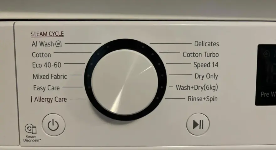 Panel pralki z programami: Al Wash, Cotton, Eco 40-60, Mixed Fabric, Easy Care, Allergy Care, Delicates, Cotton Turbo, Speed 14, Dry Only, Wash+Dry(6kg), Rinse+Spin. Jak prać wełnę w pralce? Wybierz delikatny program.