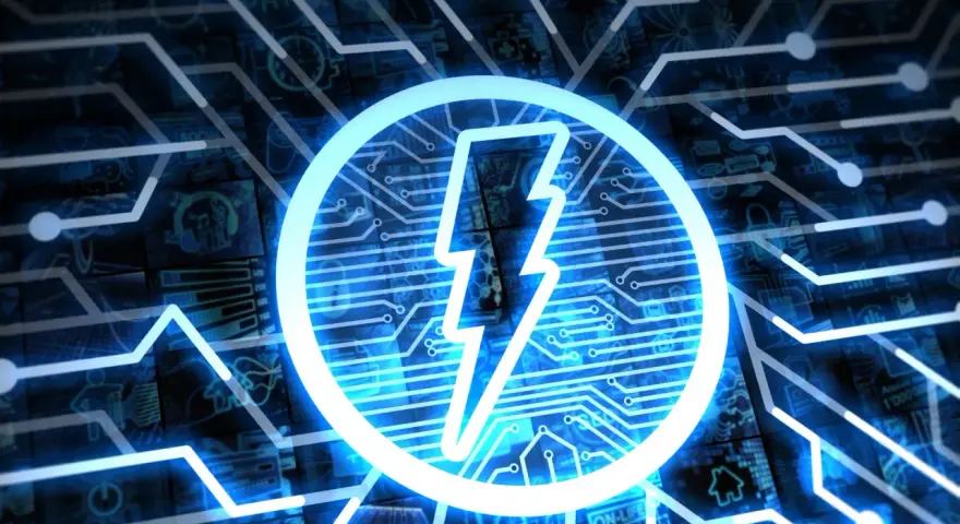 Błyskawica w okręgu na tle obwodów drukowanych. Symbolizuje energię, moc i technologię. Zastanawiasz się, ile to kWh?