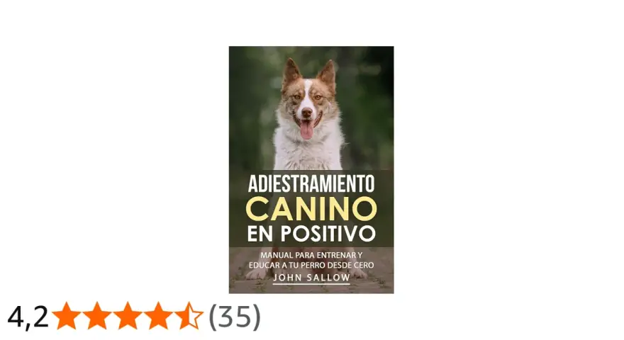 Un perro feliz sonríe en la portada de "Adiestramiento Canino en Positivo", un manual para el entrenamiento de perros.