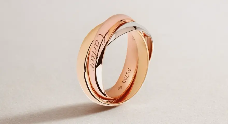 Bague Trinity de Cartier en or rose, or jaune et or blanc, gravée du poinçon cheval.