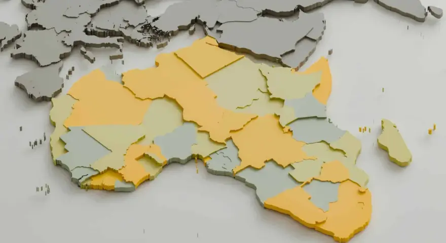 Mapa Afryki z zaznaczonymi regionami w kolorach żółtym i zielonym. Kontynent sąsiaduje z Europą.