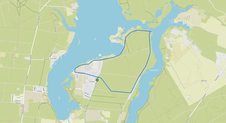 Mapa turystyczna z zaznaczoną trasą wokół **zalewu Koronowskiego**. Widoczne drogi, zabudowania i linie brzegowe.