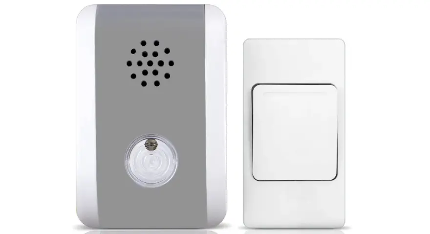 Un timbre inalámbrico para casa, con un receptor gris y blanco y un pulsador blanco.