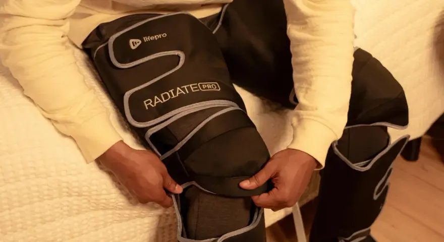 Person zips up leg compression machine. Consult your doctor on how long should you use leg compression machine for best results.