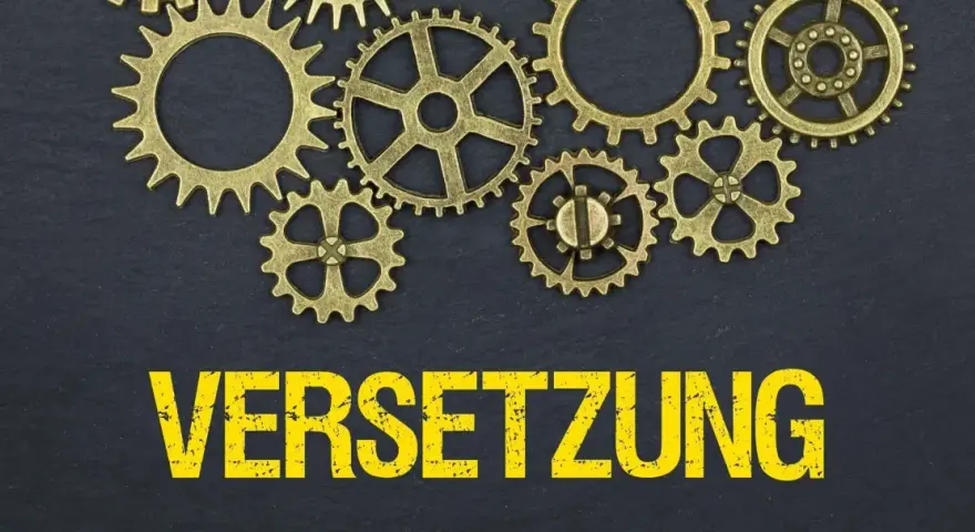 Zahnräder und das Wort "VERSETZUNG" in Großbuchstaben. Ein formloser versetzungsantrag muster könnte hier nützlich sein.