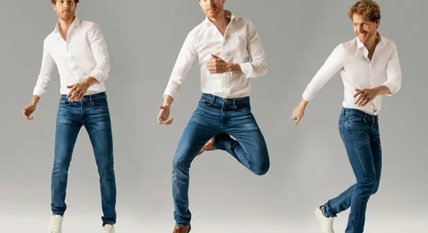 Uomo con camicia bianca e jeans blu, in diverse pose dinamiche. Il taglio tapered fit dei jeans valorizza la figura.