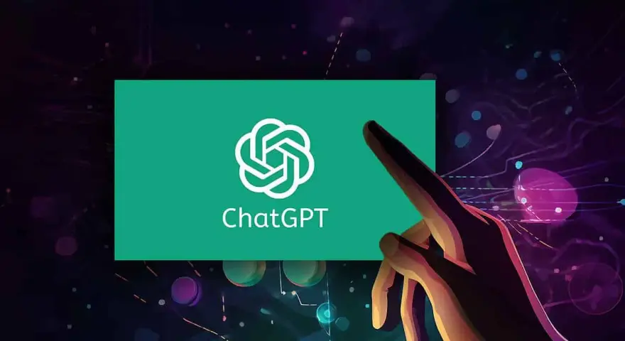 Dłoń dotyka ekranu z logo ChatGPT, symbolizując interakcję z zaawansowaną sztuczną inteligencją GPT.