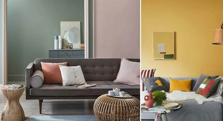 Canapé gris avec coussins aux couleurs variées, dont un coussin corail et un blanc cassé. Ambiance cosy et moderne.