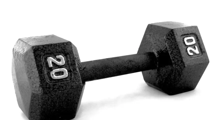 En svart hantel med vikten 20 kg, redo för ett intensivt drop set.