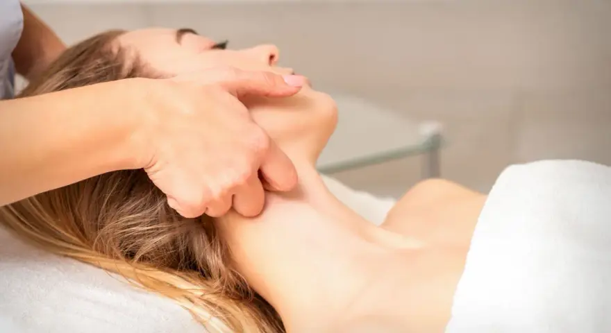 Estheticians can perform lymphatic drainage massage on a client's neck and face, promoting relaxation and fluid movement.