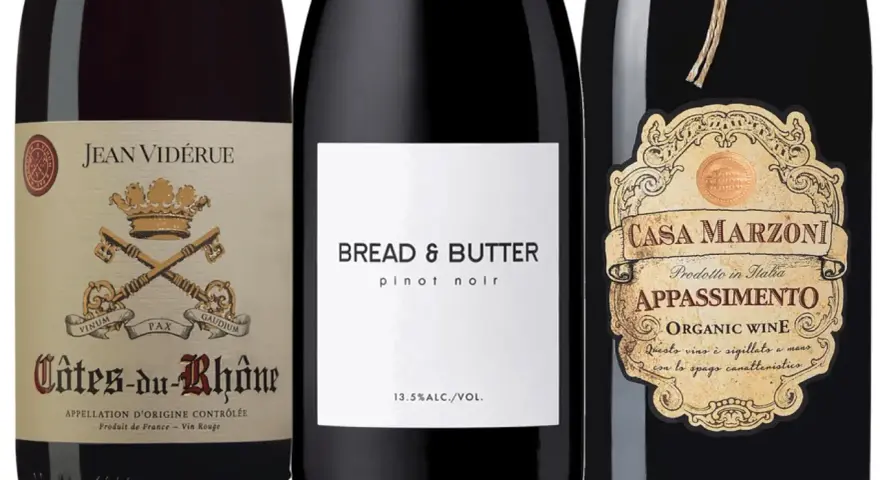 Tre röda viner: Jean Vidérues Côtes-du-Rhône, Bread & Butter Pinot Noir och Casa Marzoni Appassimento. Så här kan vin kallas.