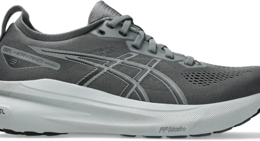 Grå löparsko, Asics Gel-Kayano 31, med vit mellansula och svarta detaljer. Perfekt för din nästa löprunda.